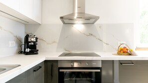 Fridge, oven, dishwasher, cookware/dishes/utensils