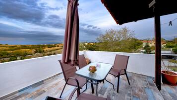 Rom – deluxe, byutsikt | Terrasse/patio