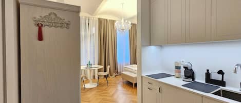 Fridge, microwave, stovetop, coffee/tea maker