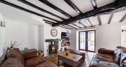 Wood burner, two lounges and a large garden for up to 8 guests