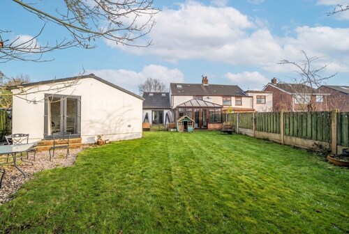 Wood burner, two lounges and a large garden for up to 8 guests