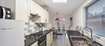 Spacious coastal cottage with enclosed garden and fireplace