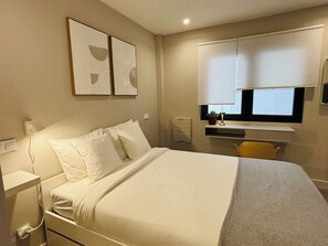 1 habitación, tabla de planchar con plancha, wifi y ropa de cama 