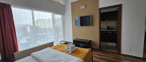 1 slaapkamer, een strijkplank/strijkijzer, wifi, beddengoed