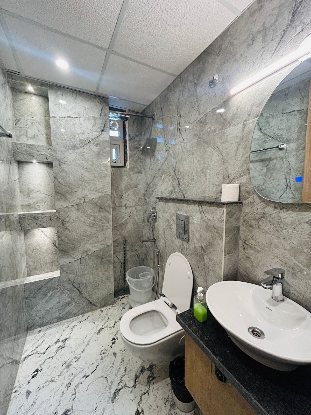 Shower, slippers, towels, soap