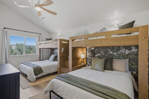 4 bedrooms, desk, iron/ironing board, travel cot
