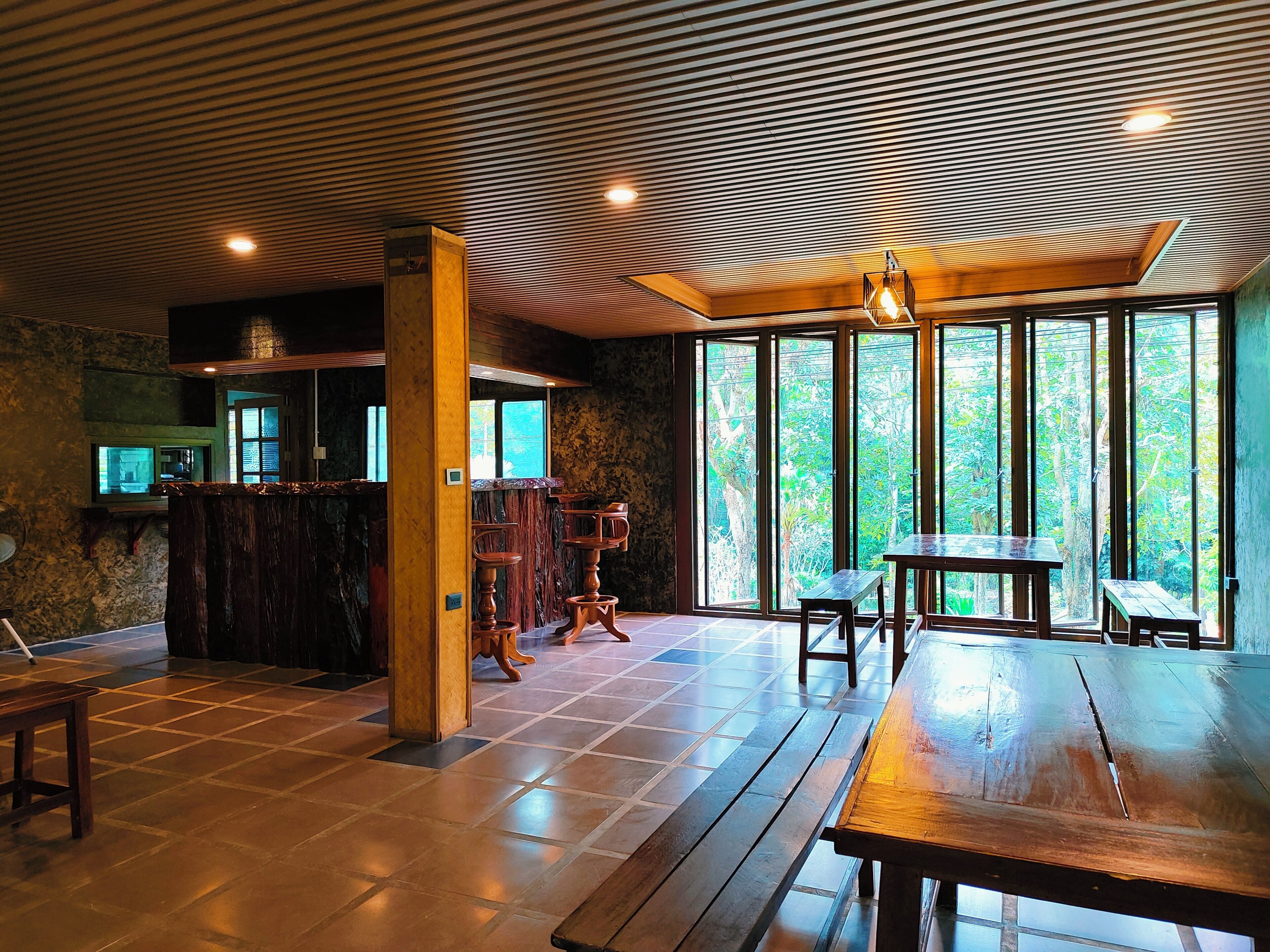 Lunch, dinner served; Thai cuisine, garden views 