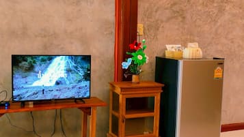 Trippelrum - utsikt mot trädgården | Interiör