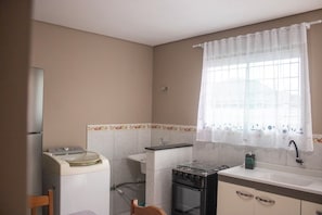 Fridge, microwave, stovetop, electric kettle