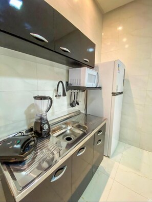 Microwave, oven, stovetop, electric kettle - Coração do Meu Sertão: Casa c Piscina e Ar (Piranhas)