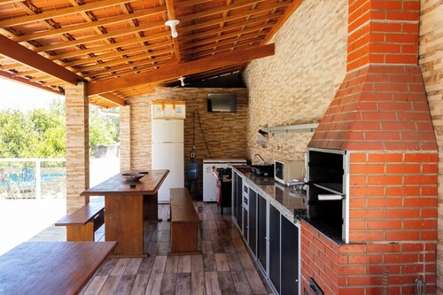 Casa bem equipada com piscina,churrasqueira e WiFi