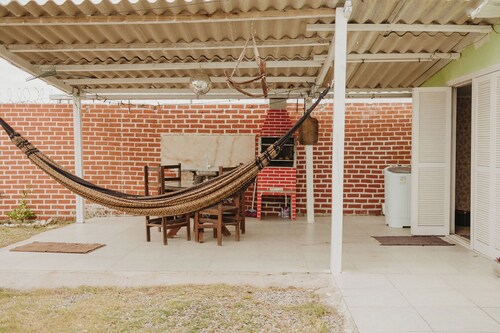 Casa com Churrasqueira, Quintal, Ar Cond e Garagem