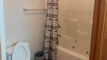 Jetted tub, hair dryer, towels, soap