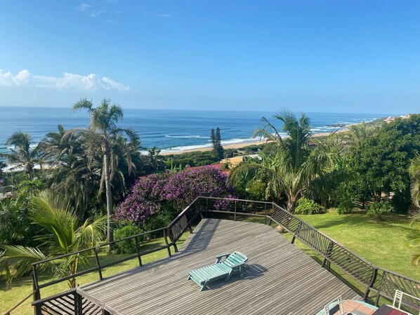 Habitación doble Deluxe, vista al mar | Terraza o patio