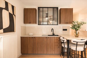 Apartment, City View | Private kitchen | Espresso maker, coffee/tea maker, highchair - 1527 Bargue (Paris)