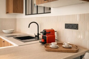 Apartment, City View | Private kitchen | Espresso maker, coffee/tea maker, high chair - 1527 Bargue (Paris)