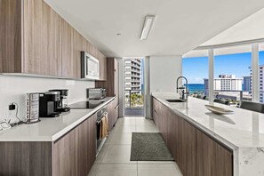 Fridge, microwave, oven, stovetop - Ocean-View Luxury 3BR | Pool, Gym & Beach Access (Fort Lauderdale)