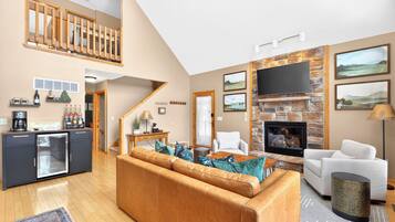 Smart TV, fireplace, foosball