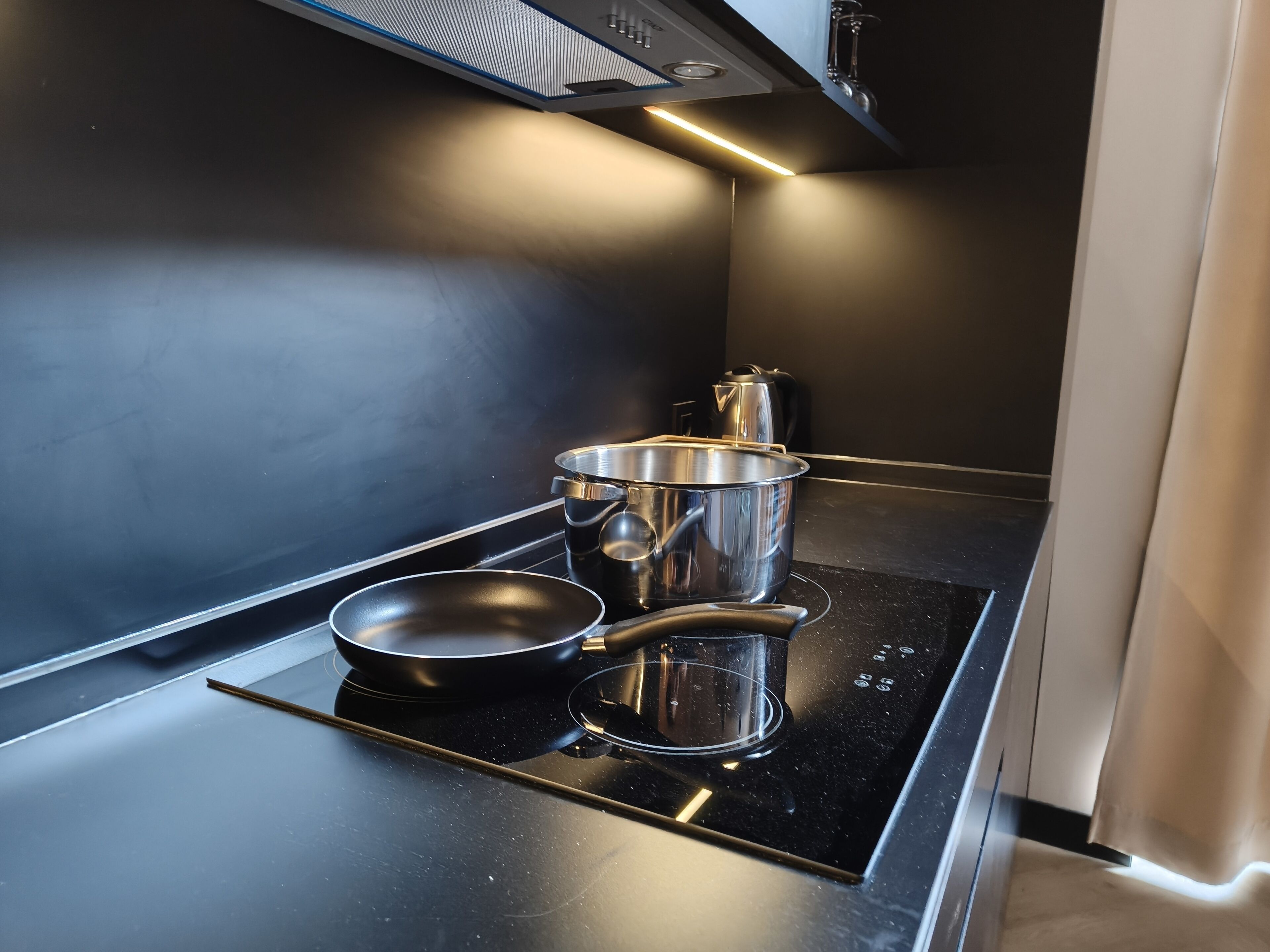 Microwave, toaster, cookware/dishes/utensils, dining tables