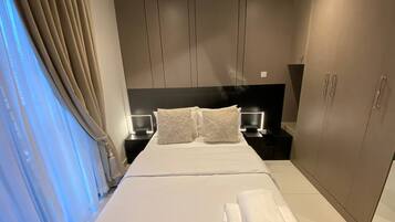 Deluxe Studio Suite, Balcony, City View | Laptop workspace, free WiFi