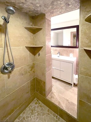 Shower, hair dryer, towels, soap