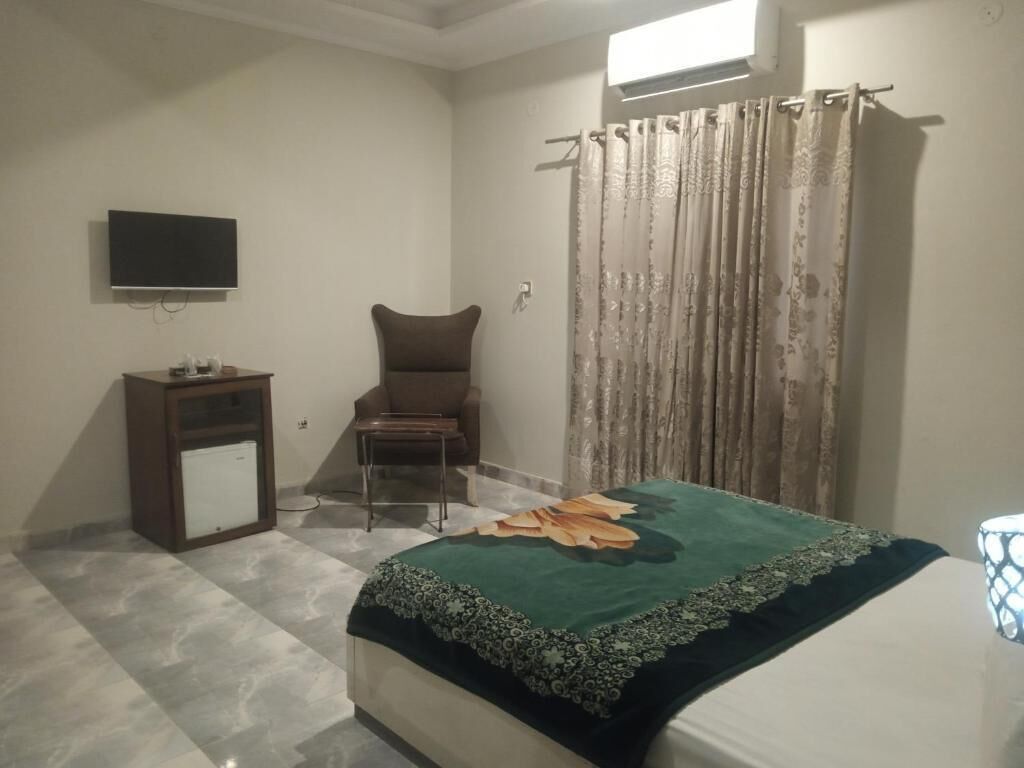 Chambre Double Deluxe | Chambres insonorisées, fer et planche à repasser, Wi-Fi gratuit