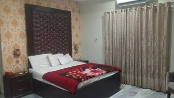 Chambre Double Deluxe | Chambres insonorisées, fer et planche à repasser, Wi-Fi gratuit