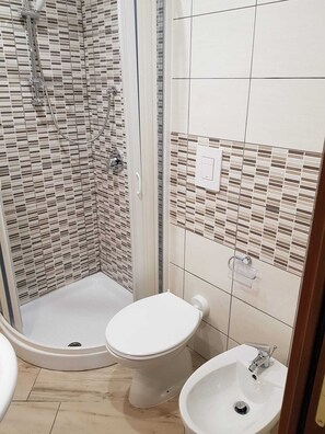 Hair dryer, towels, soap, toilet paper