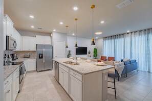 Fridge, microwave, oven, stovetop - Luxury 5BR Home w/ Private Pool at Windsor Island (Davenport)