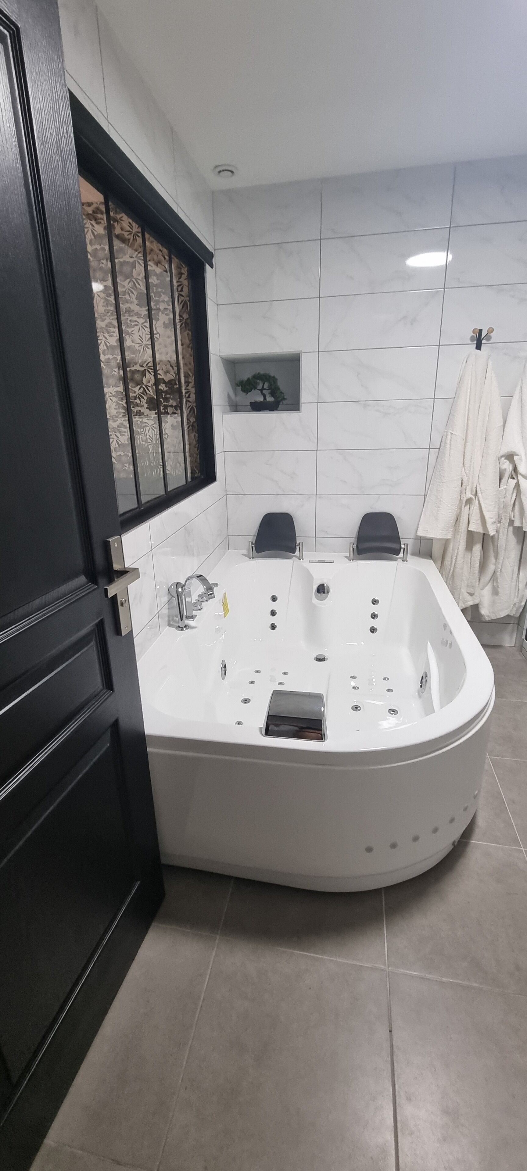 Jetted bath, hair dryer, towels, soap