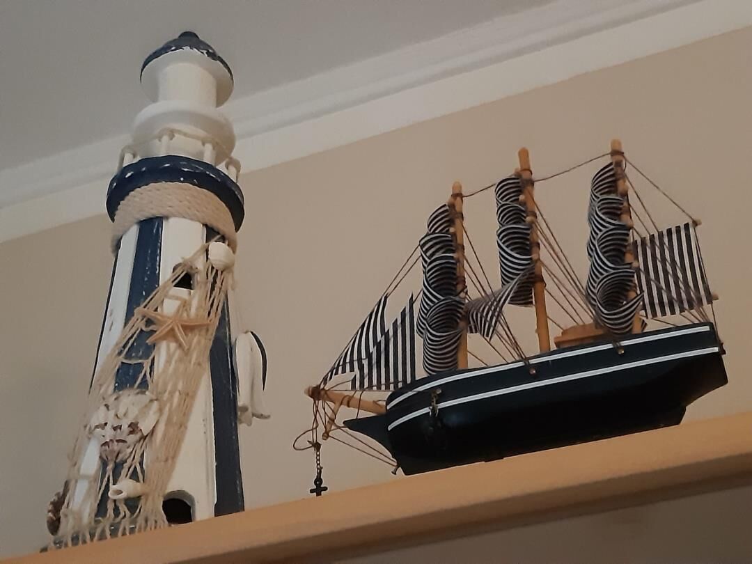 A model ship on a shelf.