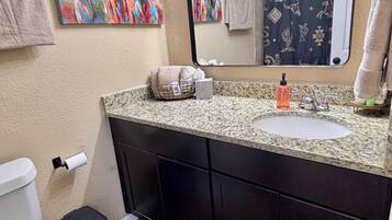 Hair dryer, towels, soap, toilet paper