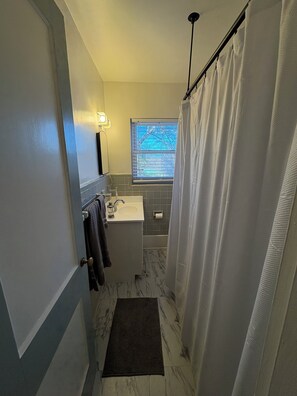 Hair dryer, towels, soap, shampoo