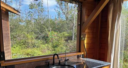 Glam camping in a private artistic solar eco-cabin