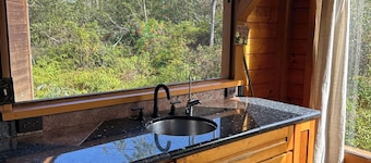 Glam camping in a private artistic solar eco-cabin