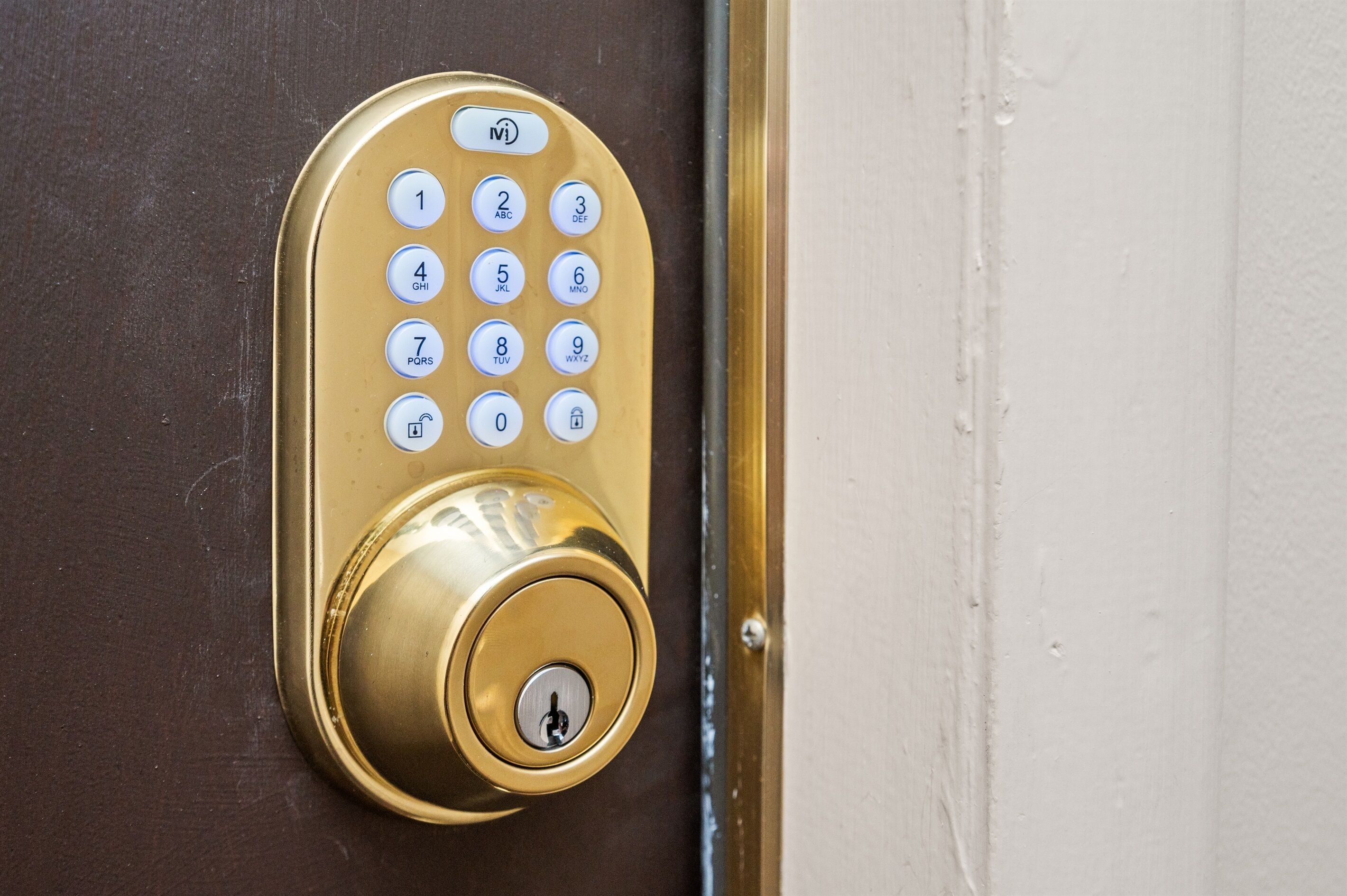 A keypad lock on a door.