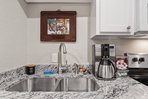 Fridge, microwave, oven, stovetop - Southside Lounge on Magnolia Midterm Rental (Fort Worth)