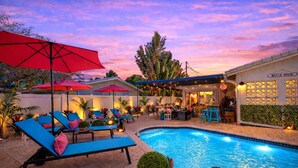 A pool area with lounge chairs and umbrellas, a bar area, and a building labeled "Beach House". - Heated Pool, Putt-Putt, Billiards, Ping Pong, Bar (Lighthouse Point)