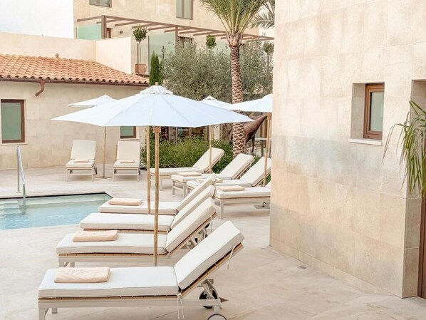 Indoor pool, seasonal outdoor pool, open open 24 hours, pool umbrellas