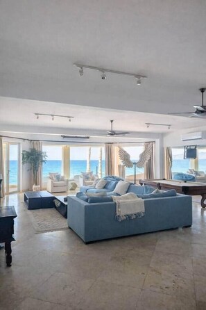 TV, fireplace - The Beachhouse At Rancho Leonero (Los Cabos)