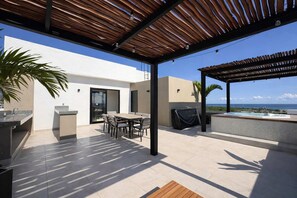 Outdoor dining - Rooftop Pool & Ocean Views in Downtown Playa (Playa del Carmen)