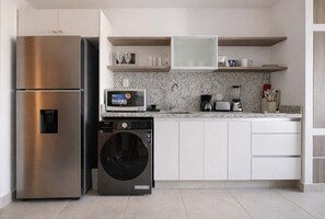 Fridge, microwave, stovetop, coffee/tea maker - Rooftop Pool & Ocean Views in Downtown Playa (Playa del Carmen)