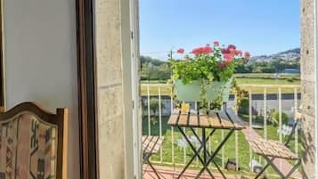 Phòng đôi Deluxe, ban công, quang cảnh vườn | Hiên