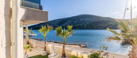 Deluxe Villa, Balcony, Beach View | Property grounds