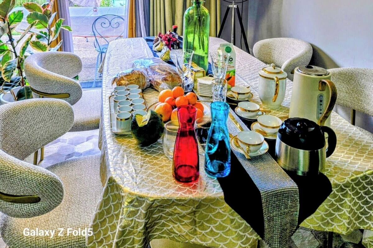 45-inch flat-screen TV with cable channels, computer monitors, printers