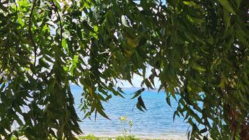 On the beach, sun loungers, beach towels