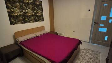 1 quarto, ferros/tábuas de passar roupa