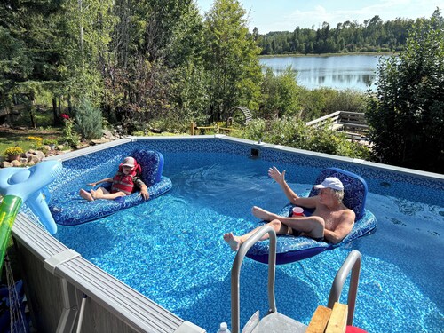 PRIVATE BEACH on a beautiful, small, spring-fed lake. AMAZING VIEWS & SUNSETS!