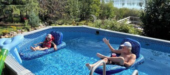 PRIVATE BEACH on a beautiful, small, spring-fed lake. AMAZING VIEWS & SUNSETS!