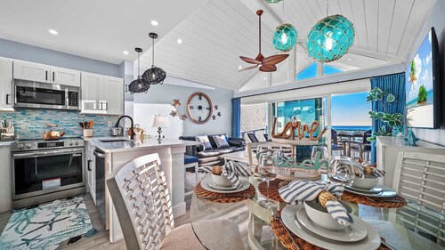 New! Beachfront Paradise! ~Heated Pool! Top Floor